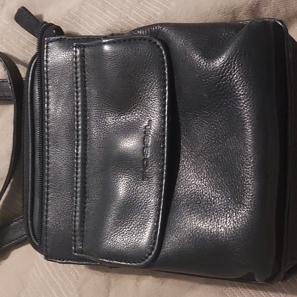 A black leather Fossil purse